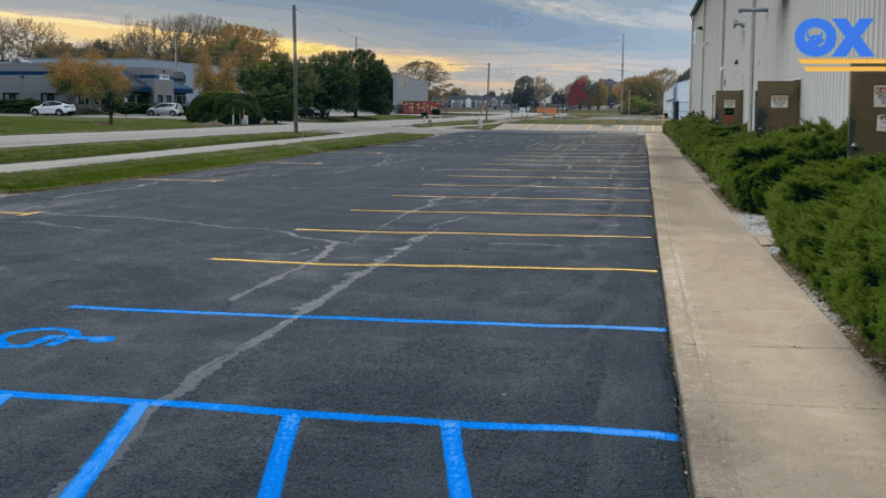 Freshly striped parking lot by Ox Asphalt