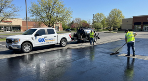 commercial sealcoating application Indianapolis parking lot spring crew