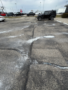alligator cracking from freeze-thaw damage on asphalt pavement